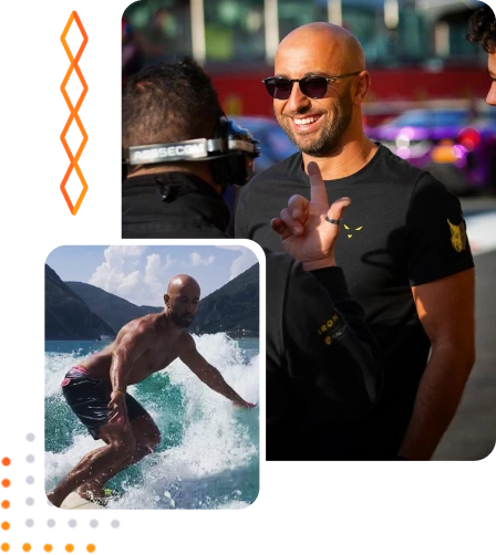 Luca Persiani sorridente e mentre fa surf